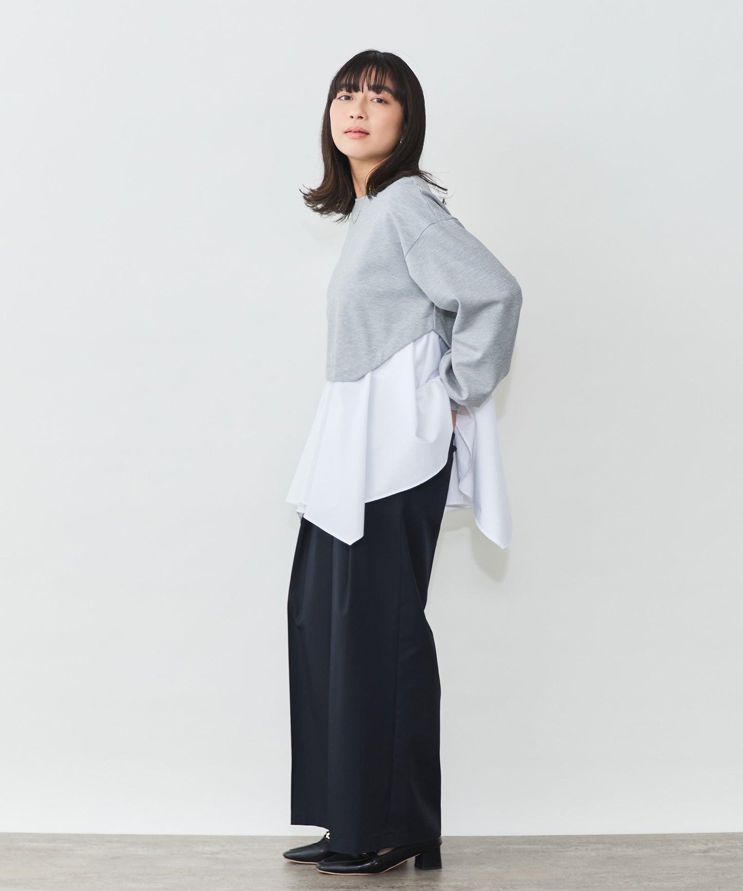 異素材ドッキングプルオーバー