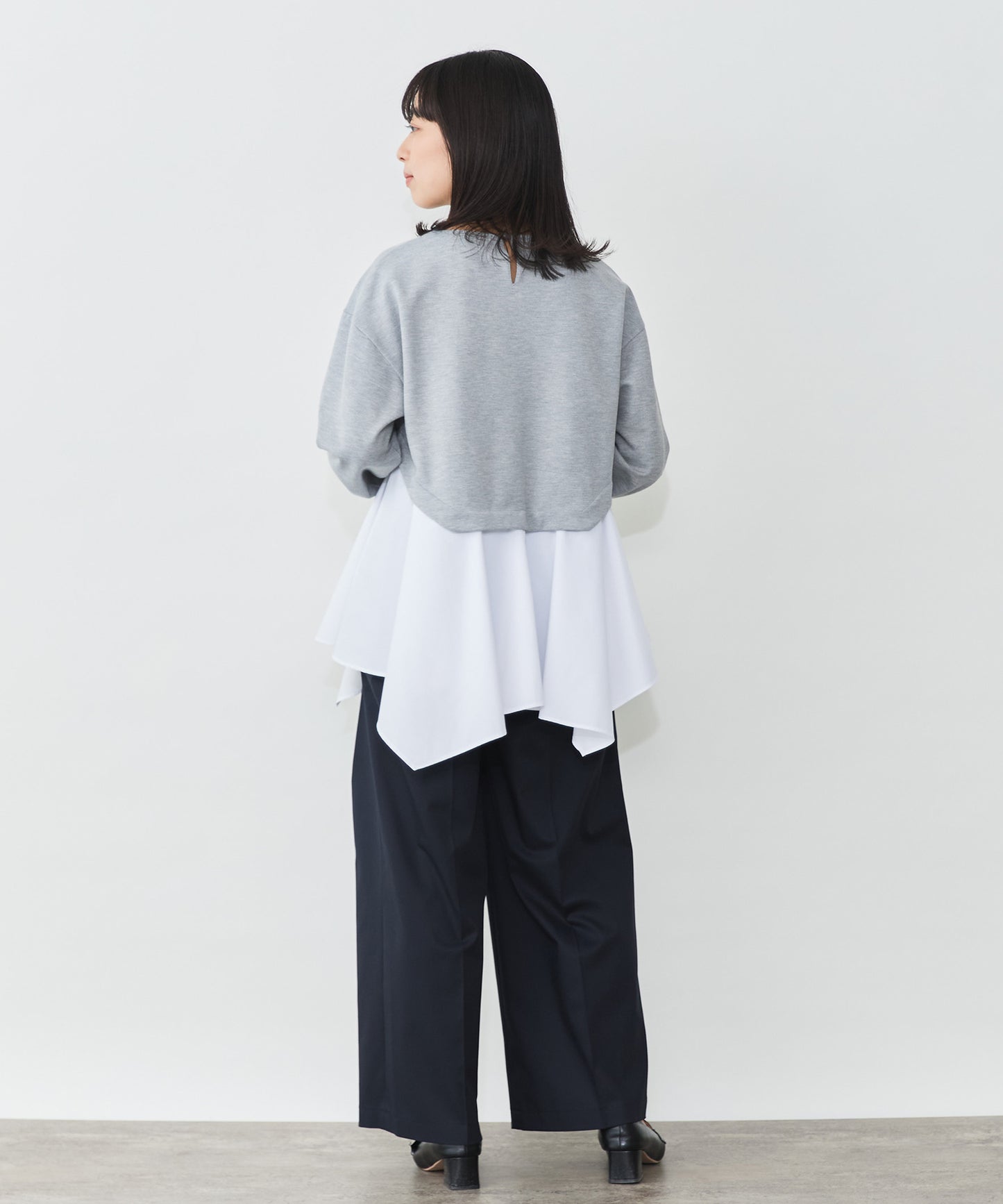 異素材ドッキングプルオーバー